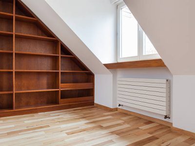 View of empty bookshelf in the attic